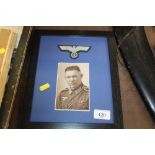 A German framed officers photo with eagle above