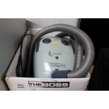 A Powerlite 'The Boss' vacuum cleaner