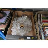 A box of drinking glasses and china