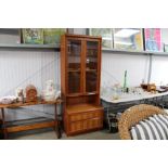 A G-plan wall unit fitted two drawers below