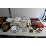 A collection of Royal Doulton dinnerware, various advertising tins, souvenir spoons, silver plated