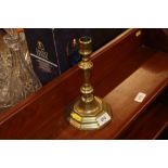 An 18th Century single brass candlestick