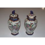 A pair of 19th Century Sampson octagonal vases and
