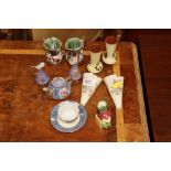 A miniature porcelain floral decorated tea set; a
