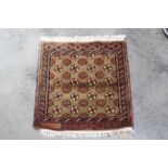 An approx. 1'5" x 1'6" Mori Jaldar rug