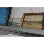 A framed print of a seaside village and a watercol