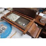 An inlaid cased wall clock