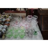 A collection of table glassware to include perfume