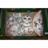 A box of miscellaneous face masks