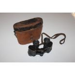 A pair of German WWI military binoculars in fitted