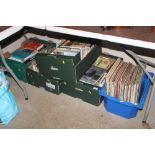 Four boxes of miscellaneous books and a box of LP