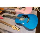 A Lino blue acoustic guitar