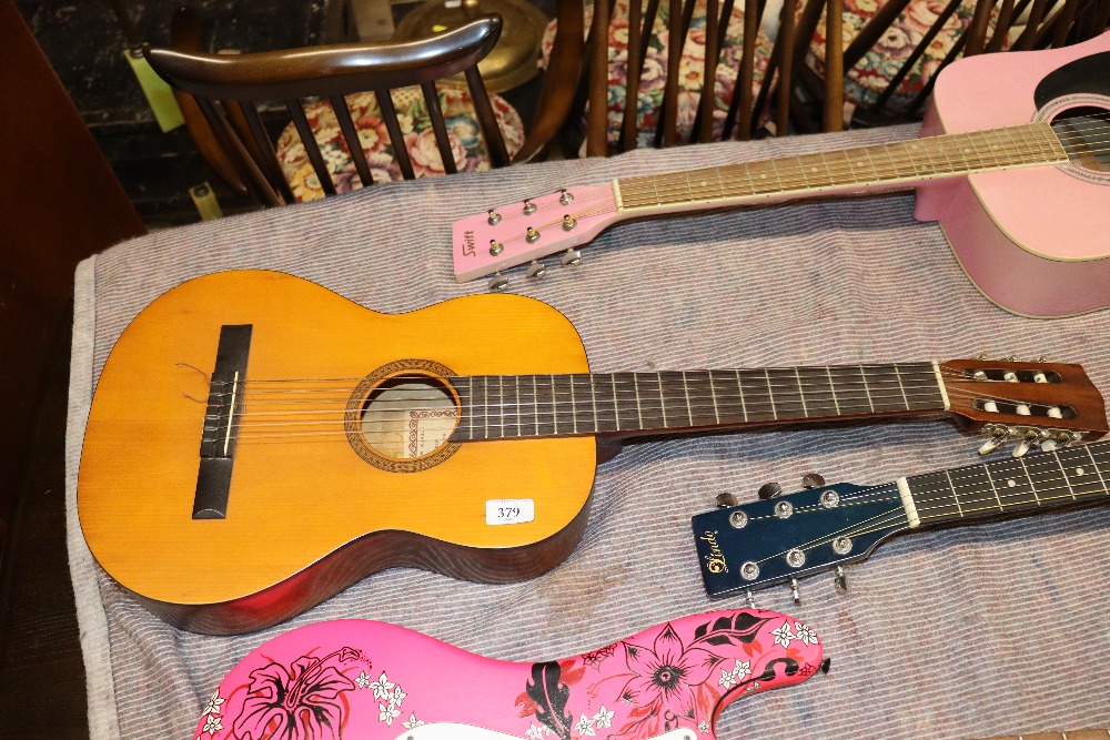 A Hokada acoustic guitar