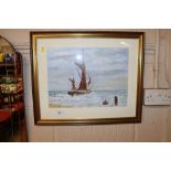 A framed and glazed oil depicting a sailing barge