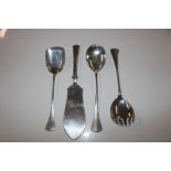 A continental white metal serving set