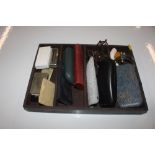 A cutlery tray and contents of spectacles, spurs,