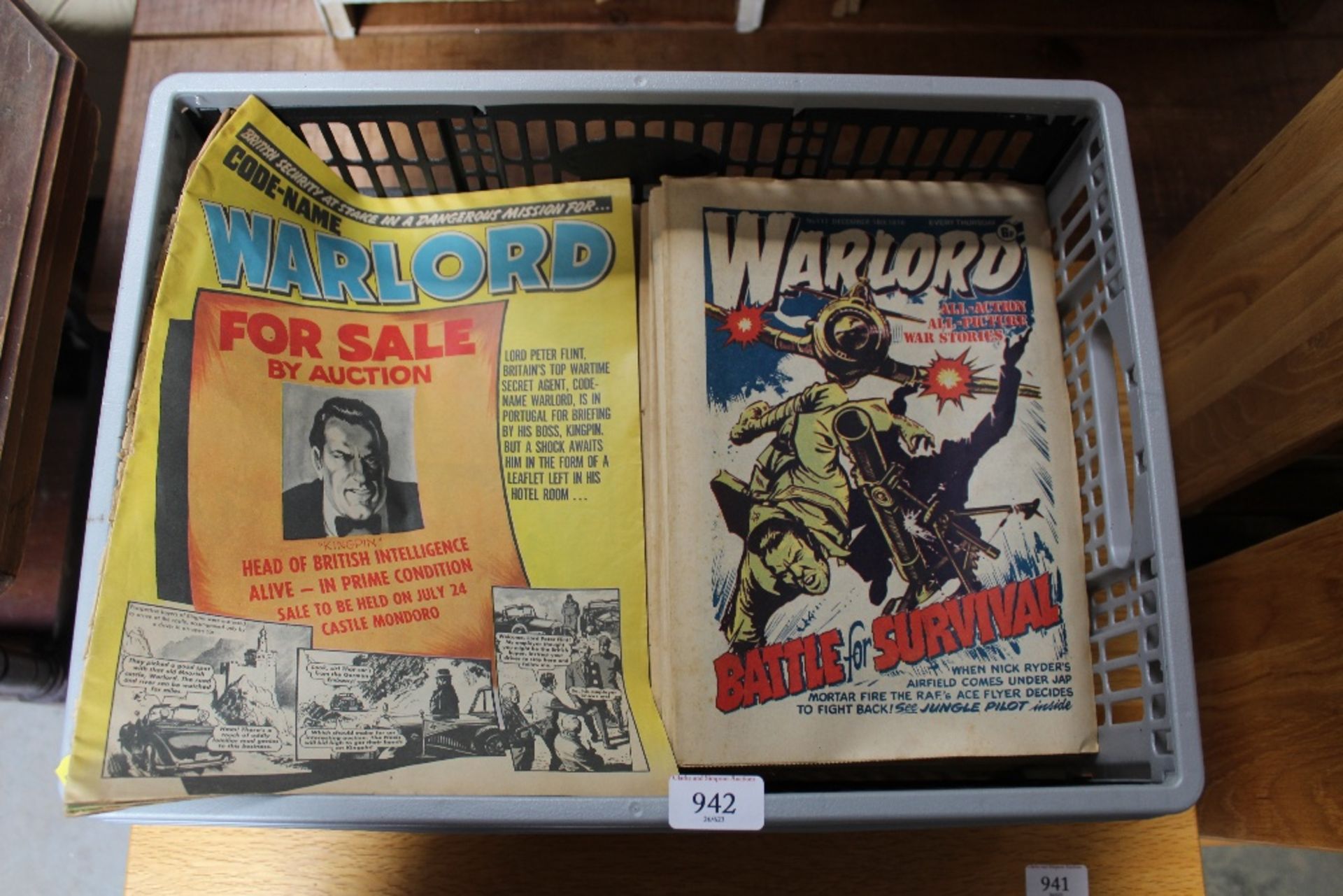 A box of 'Warlord' comic books