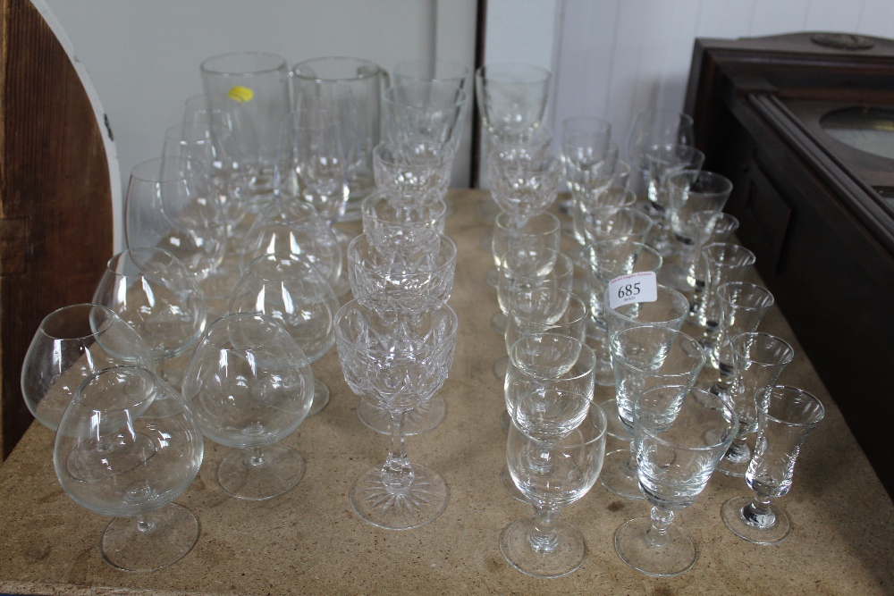 A quantity of various drinking glasses