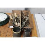 A cutlery trug and contents of various silver plat