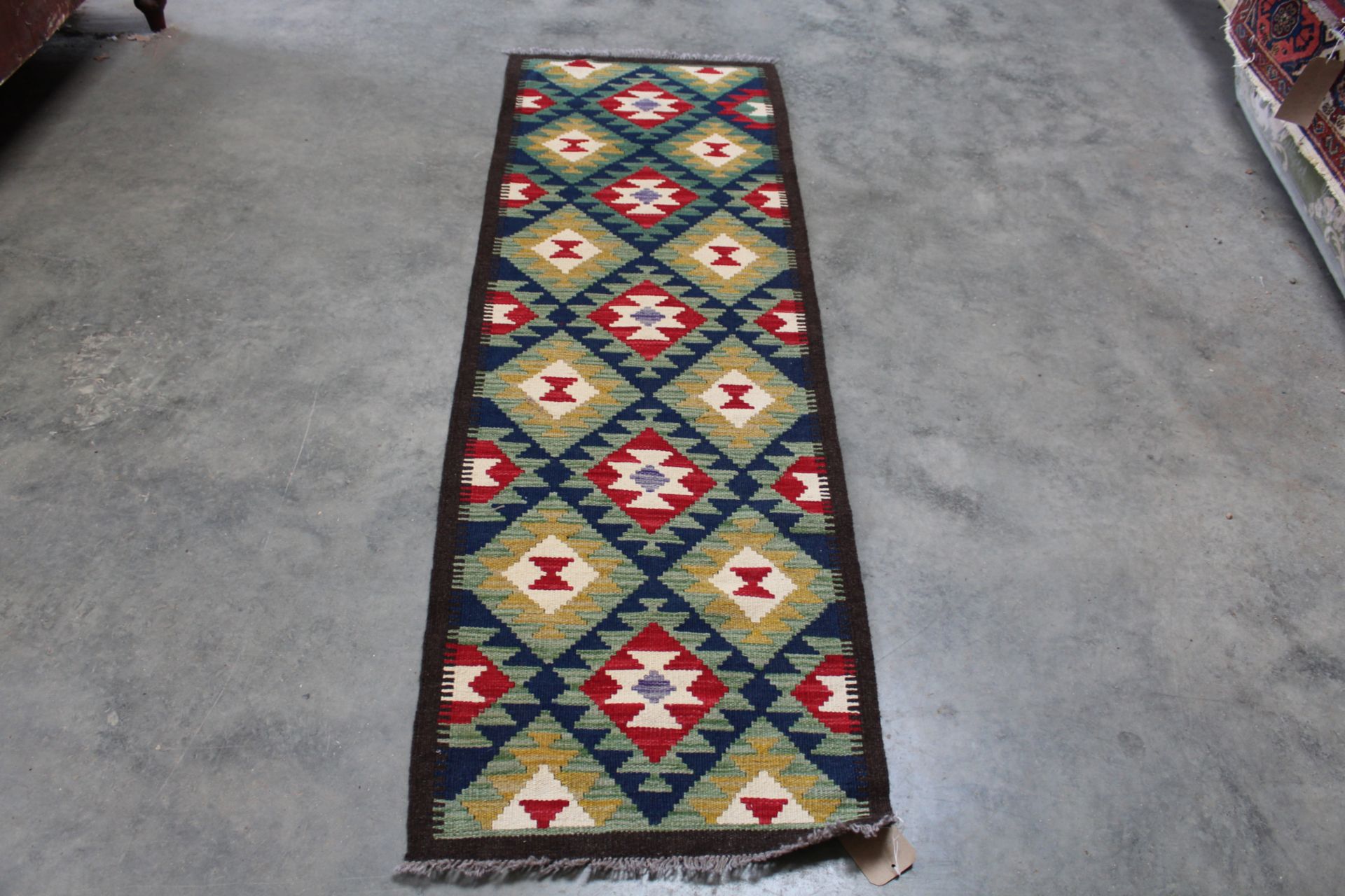 An approx. 6'5" x 2' Maimana Kelim runner