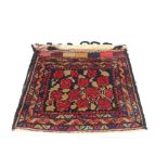 An Eastern camel bag rug, 127cm x 65cm