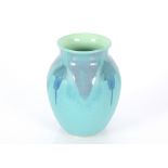 A Poole pottery baluster vase, having pale blue ru