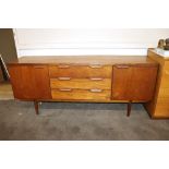 A teak G-plan design sideboard, fitted three centr