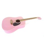 A Swift pink acoustic guitar