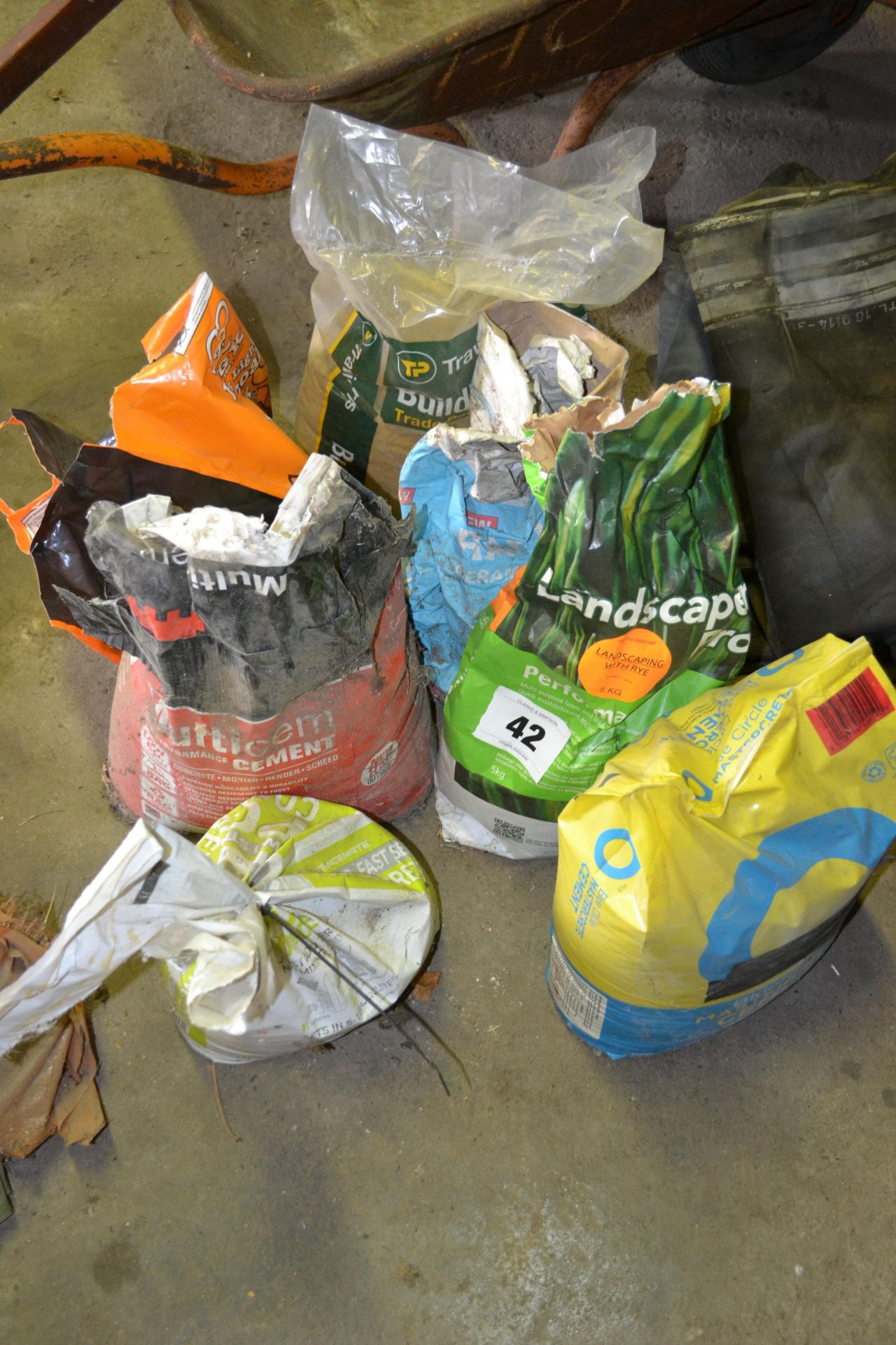 Various grass seed, cement etc. V