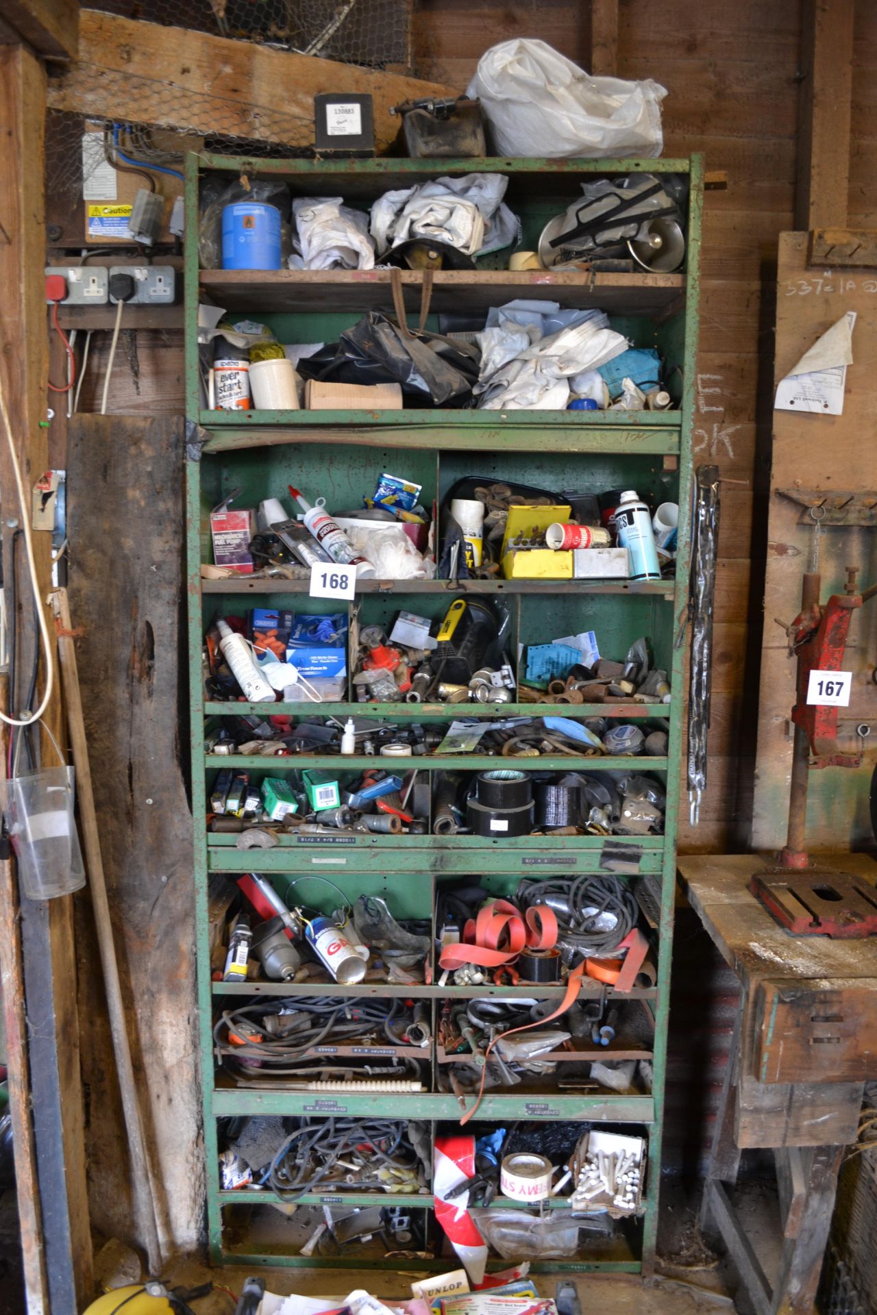 Large workshop rack with various fasteners, consum