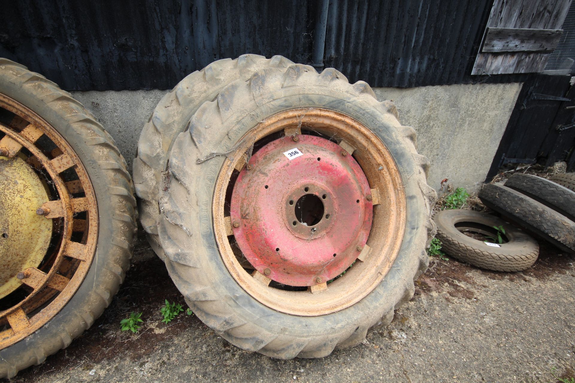 Pair of 12.4/11-36 wheels and tyres. V