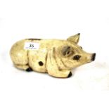 A cast iron pig money box