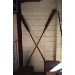 A pair of long vintage oars