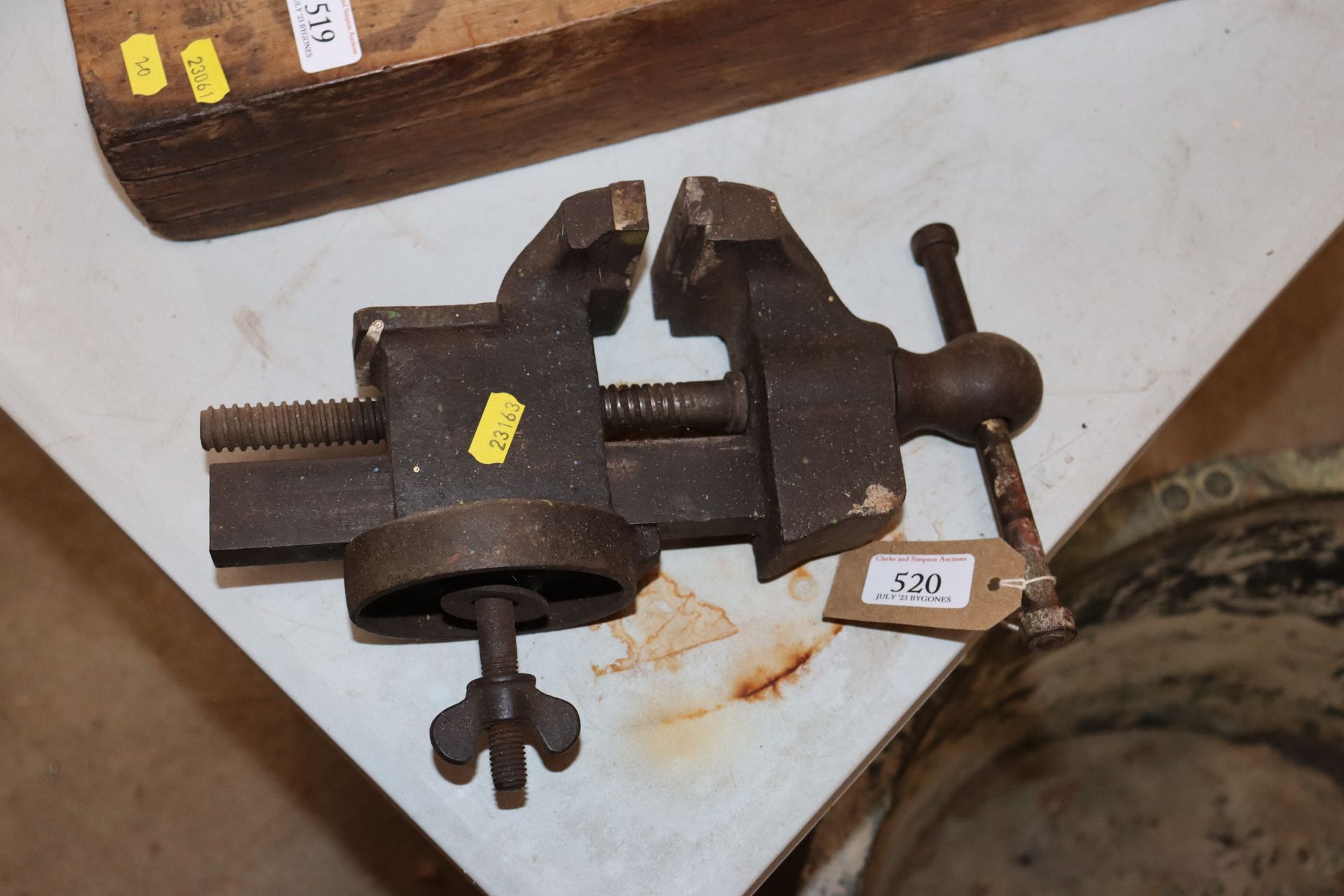 A small iron bench vice