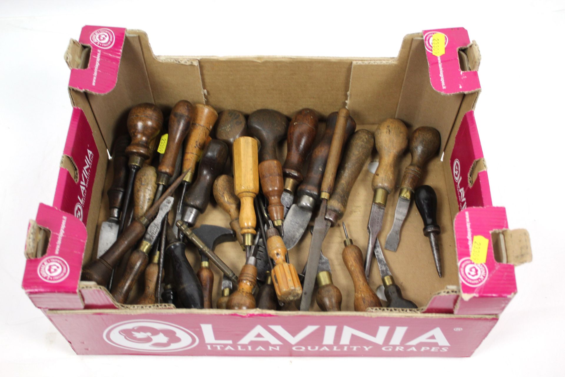 A box of small hand tools to include mainly screwd