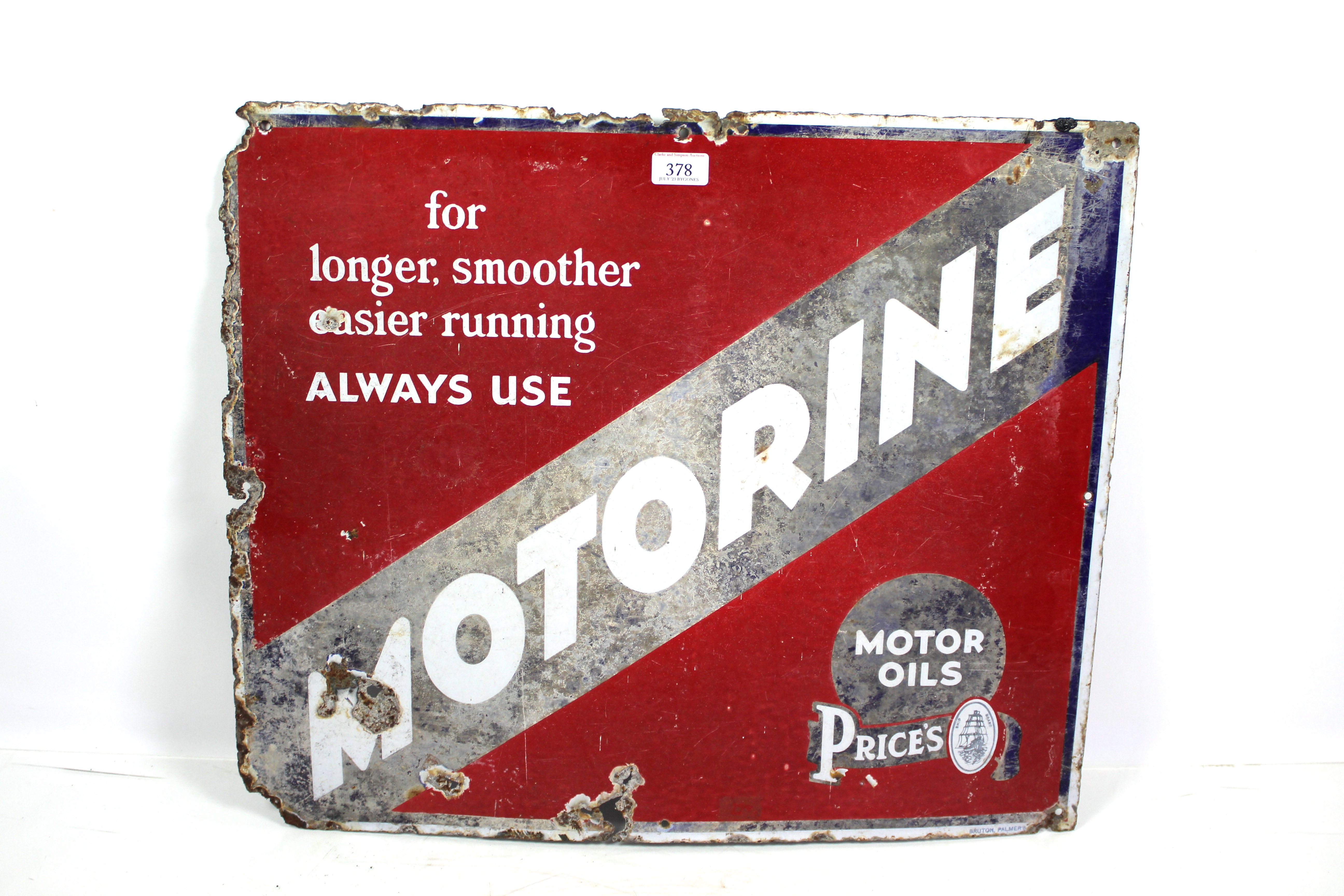 An vintage enamel advertising sign for "Motorine M