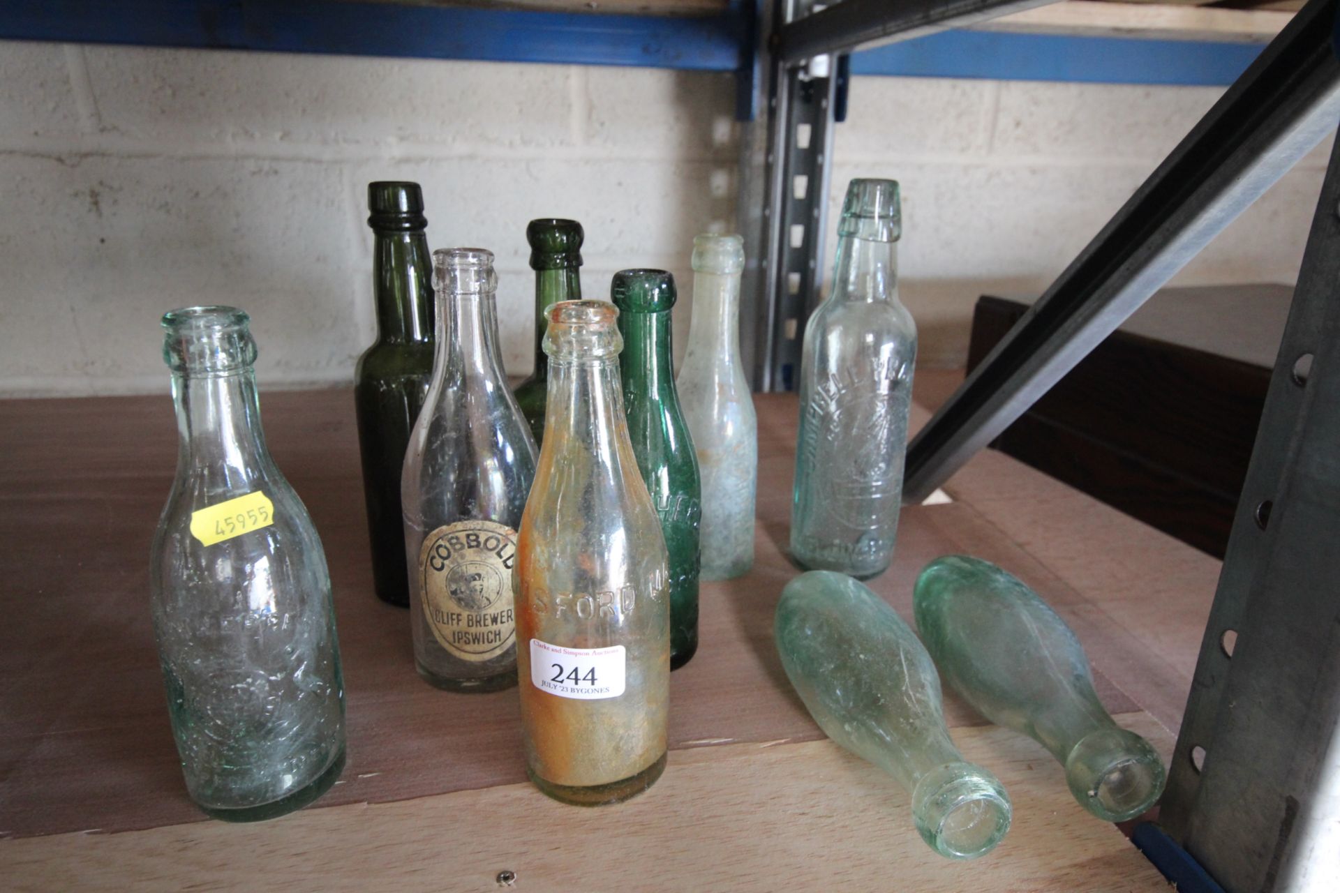 Ten various vintage glass bottles