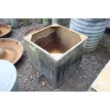 A small galvanised riveted tank complete with tap, approx. 2' x 2' x2'