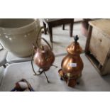 An Arts & Crafts design copper kettle on spirit he