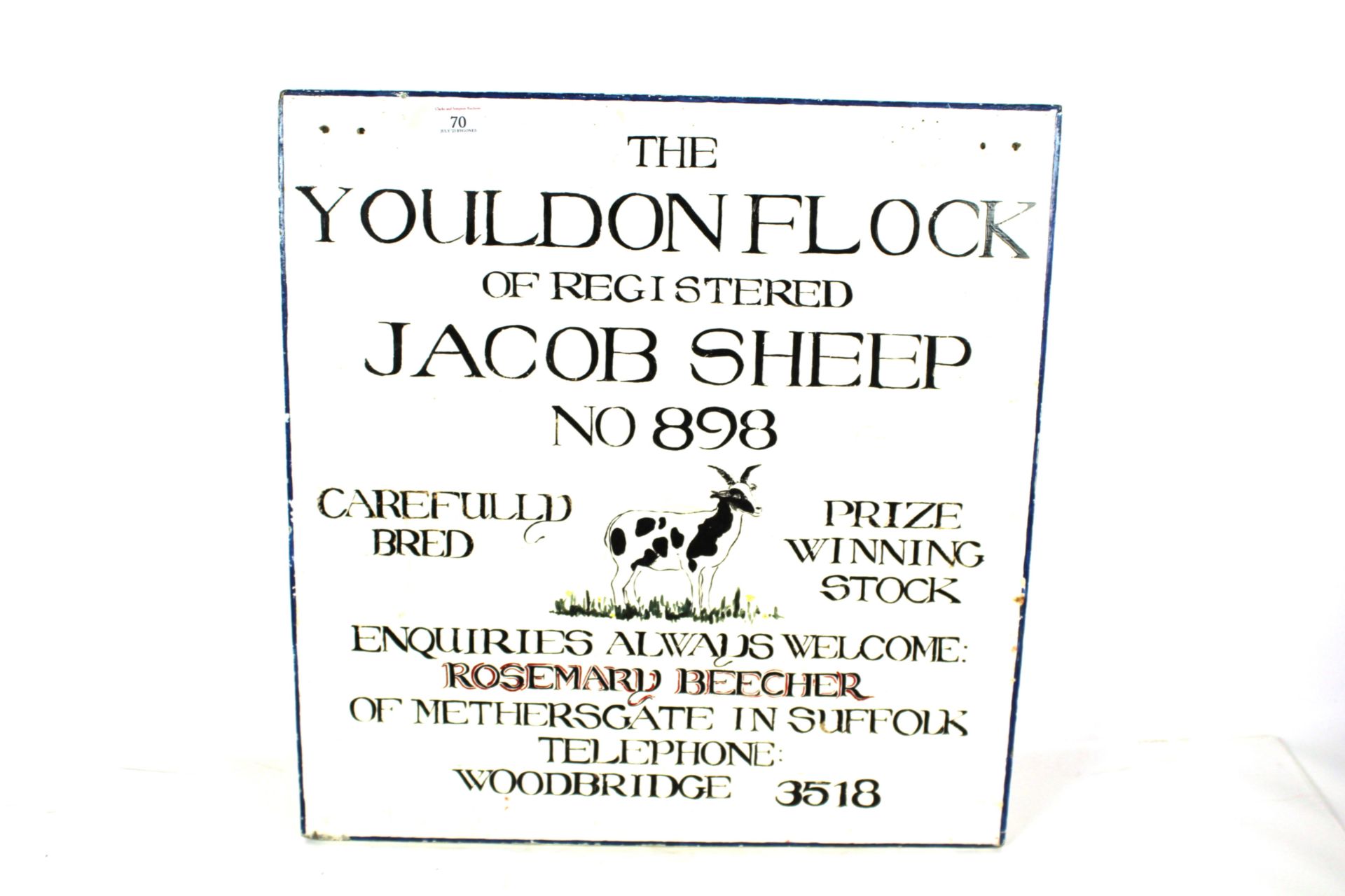 A painted wooden farm sign for the "Youldon Flock