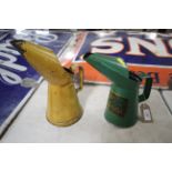 A yellow quart oil measure and a BP Energol quart