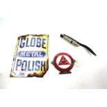 A small enamel "Globe Metal Polish" advertising si