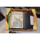 A box of various assorted books including wildlife