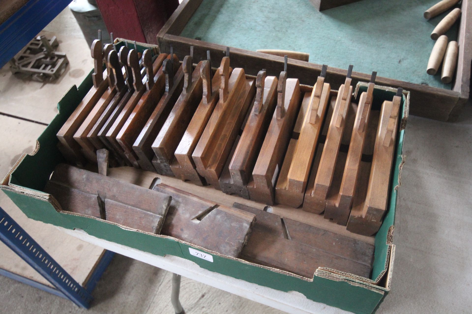 A collection of vintage wooden moulding planes