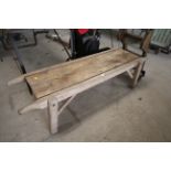 A vintage pig rendering bench