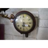 A Victorian postman's alarm wall clock