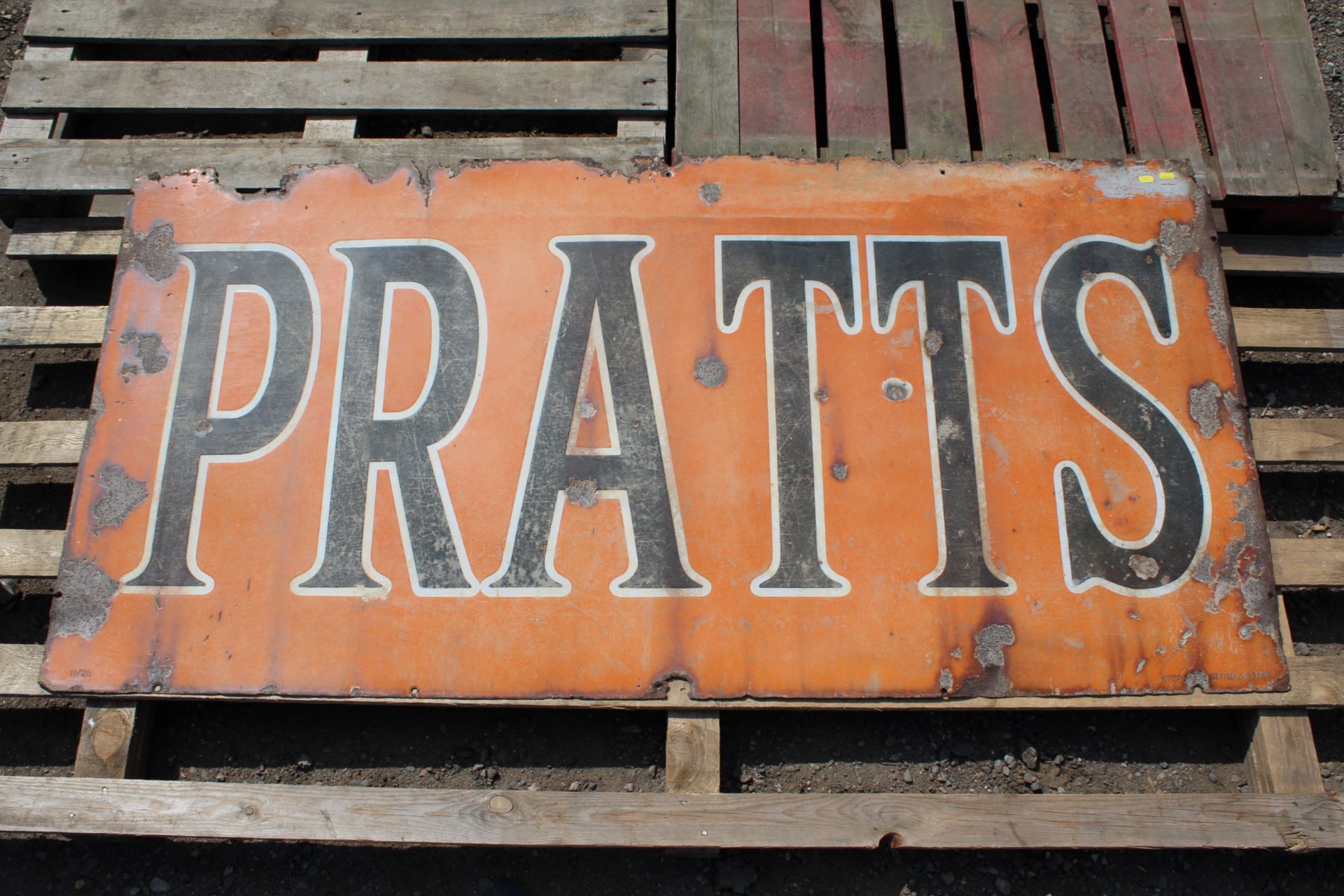 A vintage enamel advertising sign for "Pratts", ap