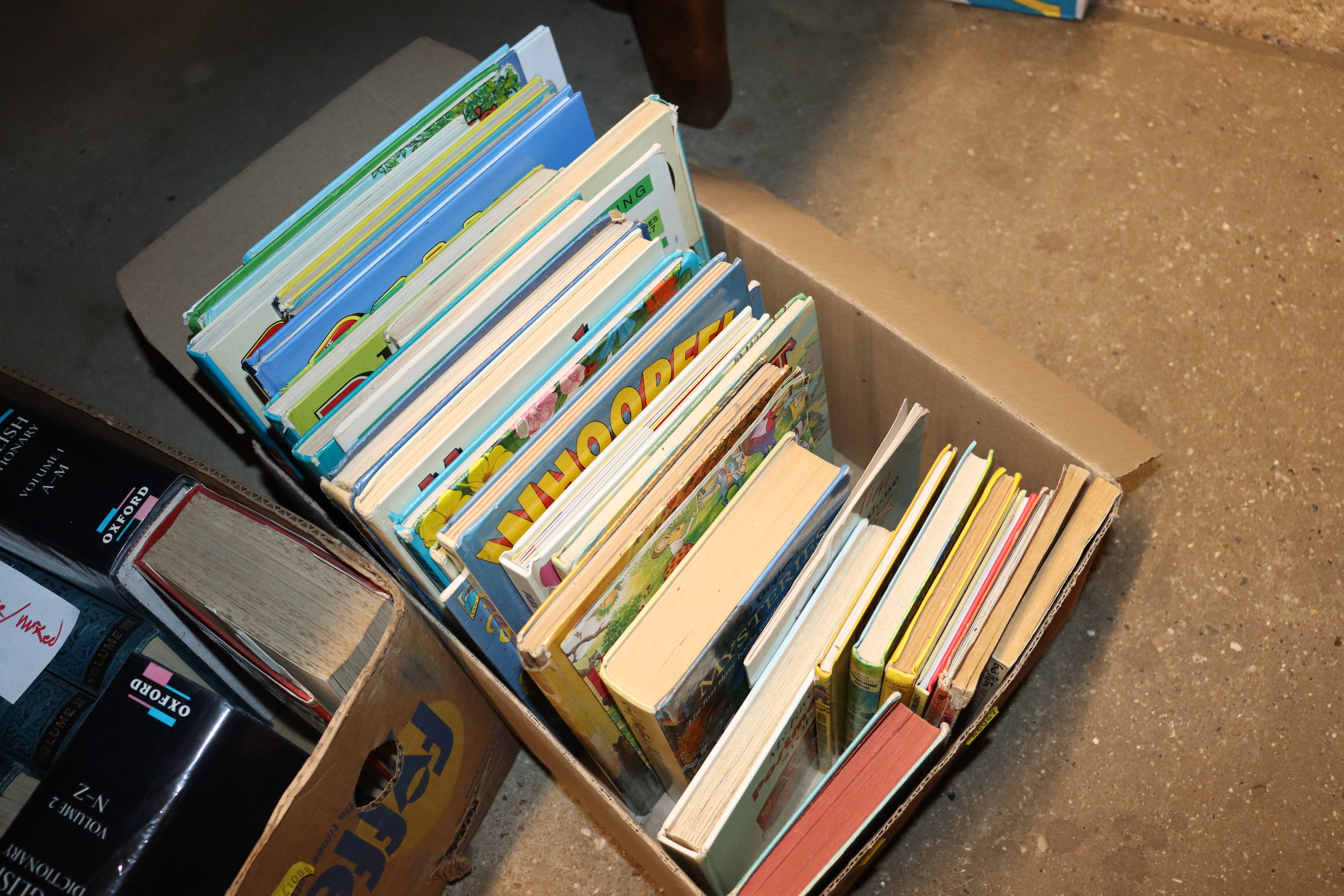 A box of miscellaneous children's books and annual