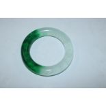 A two tone jade type bangle