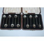 Two sets of six each cased silver coffee bean spoons, approx. total weight 72gms